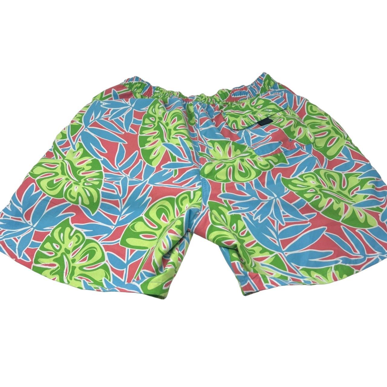 These Vineyard Vines Board Shorts flaunt a vibrant... Depop
