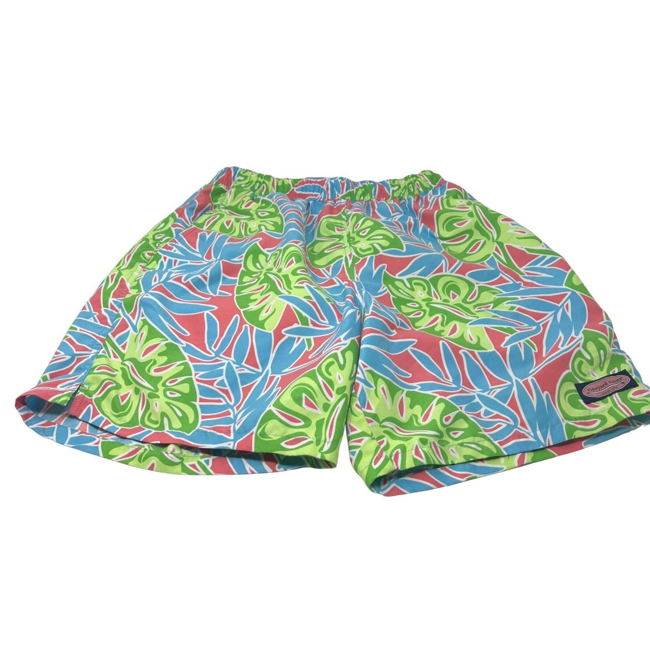 These Vineyard Vines Board Shorts flaunt a vibrant... Depop