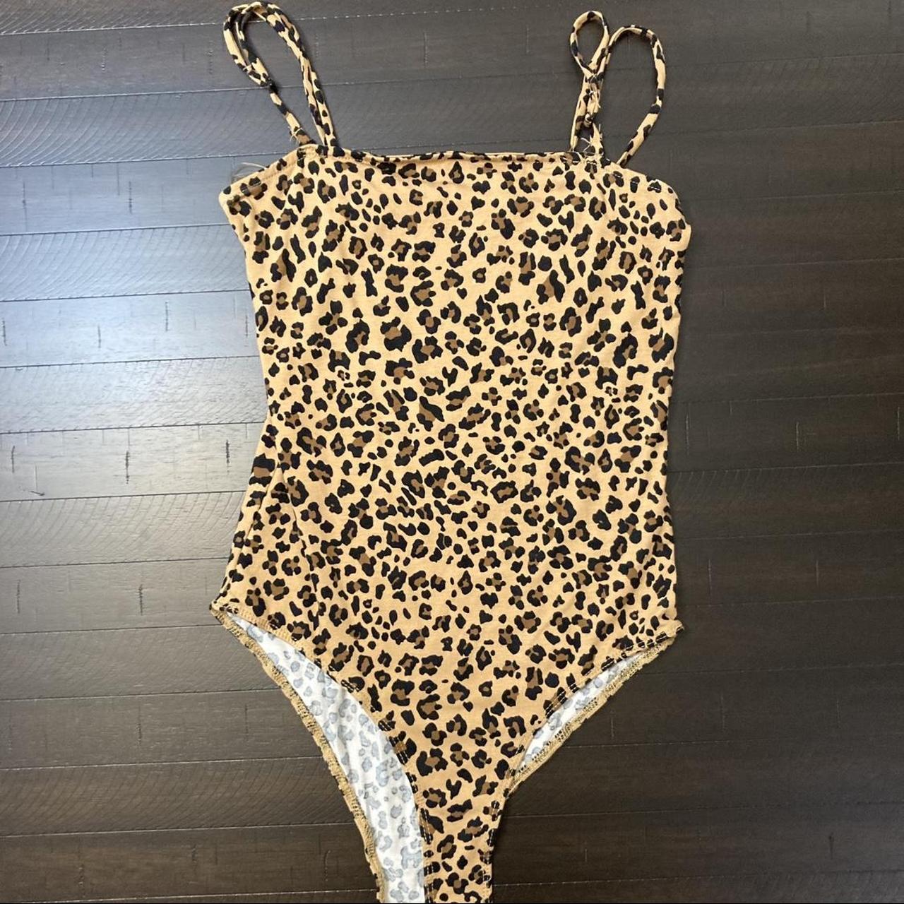 Cheetah print bodysuit - Depop