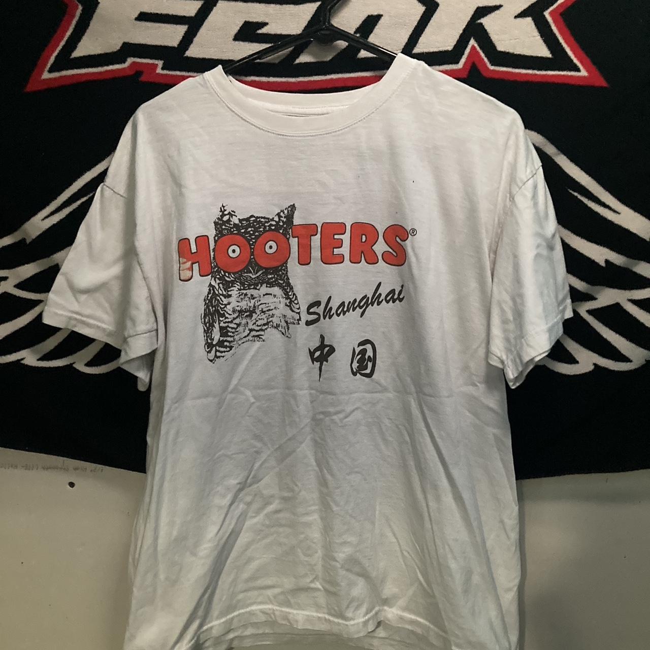 white hooters tee slight damage on the H no size tag... - Depop