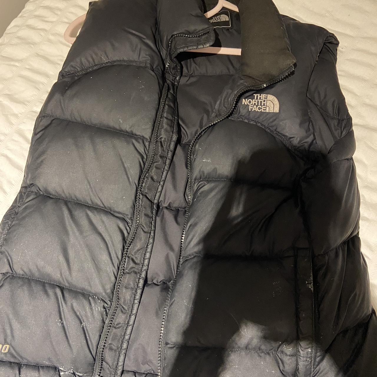 north face puffer gillet no rips in but has paint... - Depop