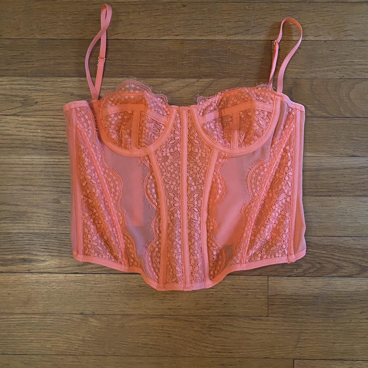 Urban Outfitters peachy orange corset top. Size... Depop