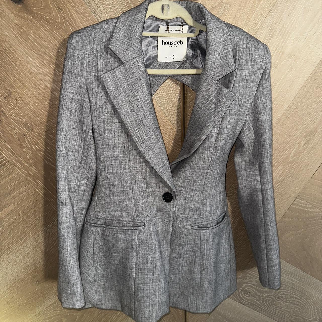 Gray backless suit never worn - Depop