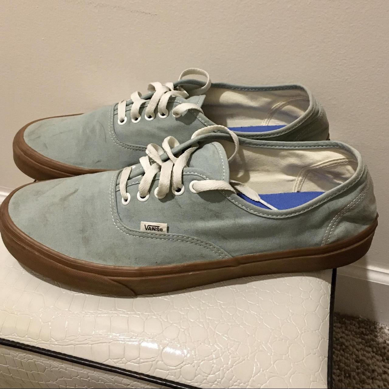 Tan and blue outlet vans