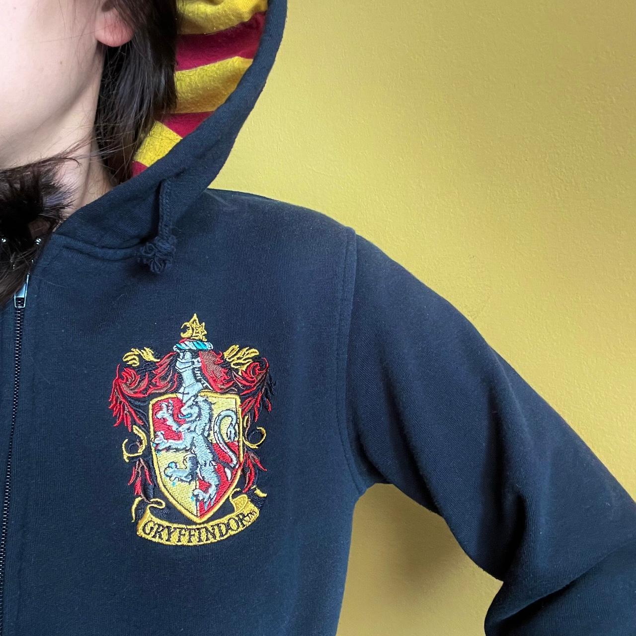 Black Gryffindor Sweater with Scarlet and Gold lined. Depop