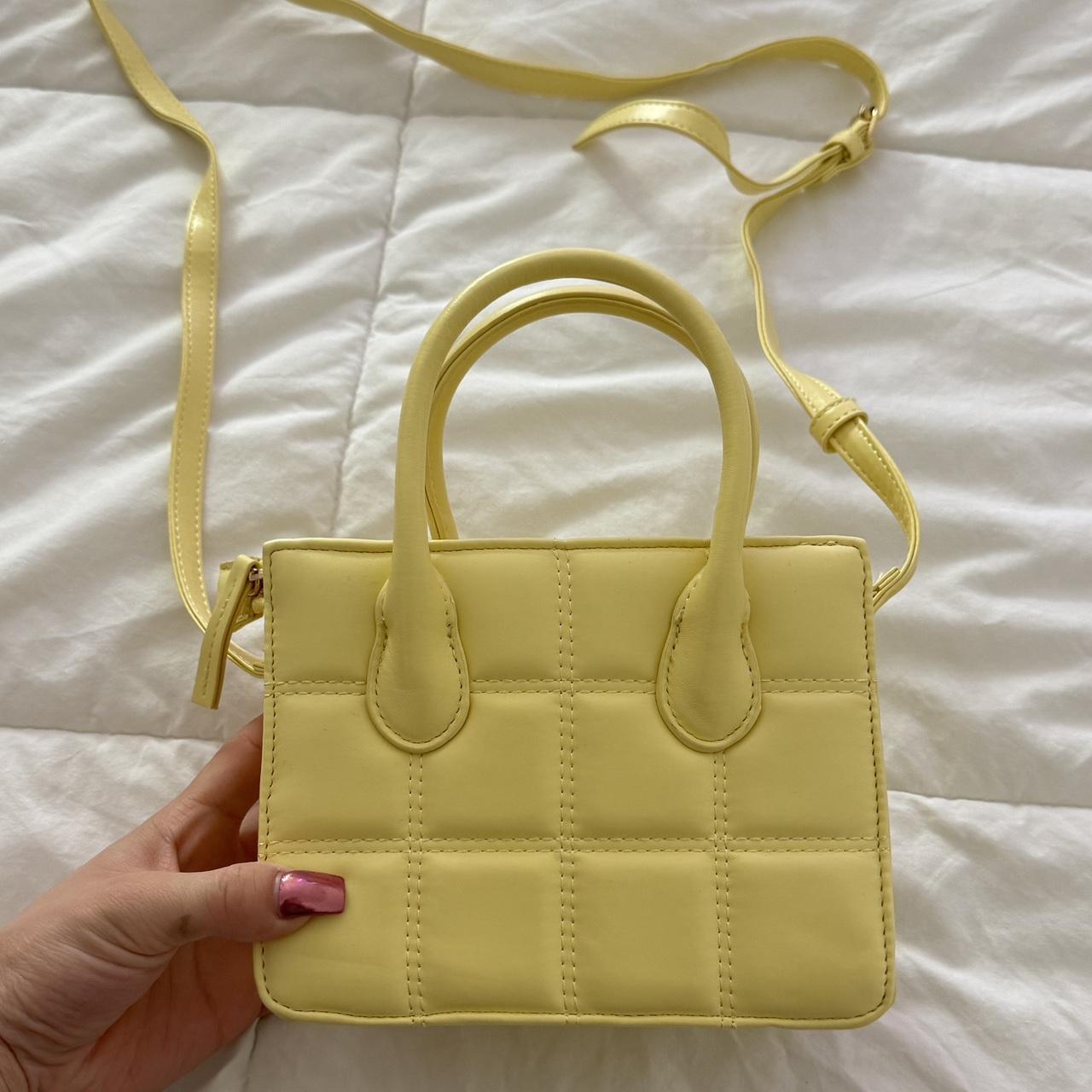 Pale yellow purse online