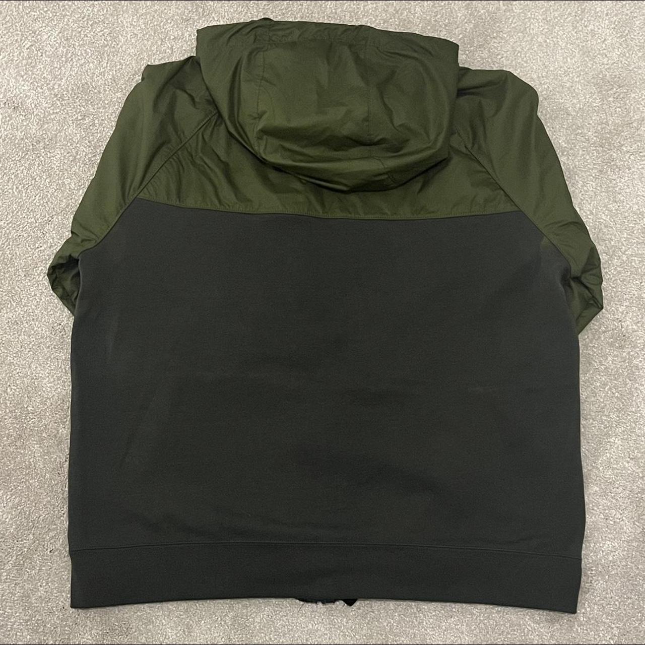 black and royal blue nike shirt