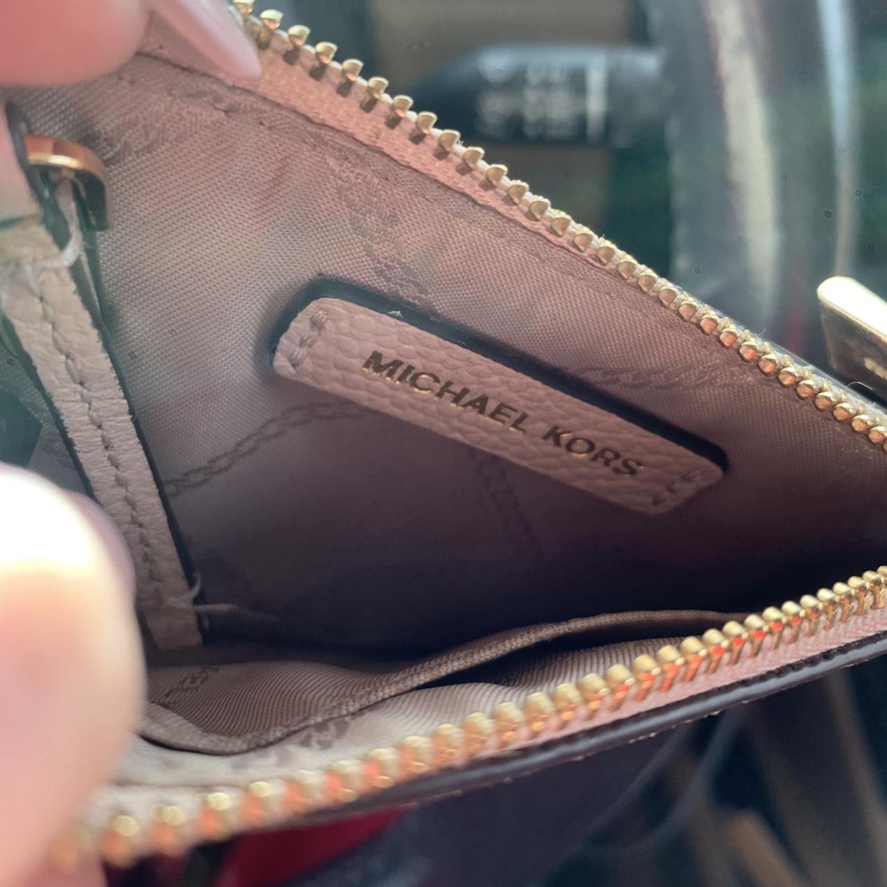 Pink Michael Kors wallet Definitely used as seen in - Depop