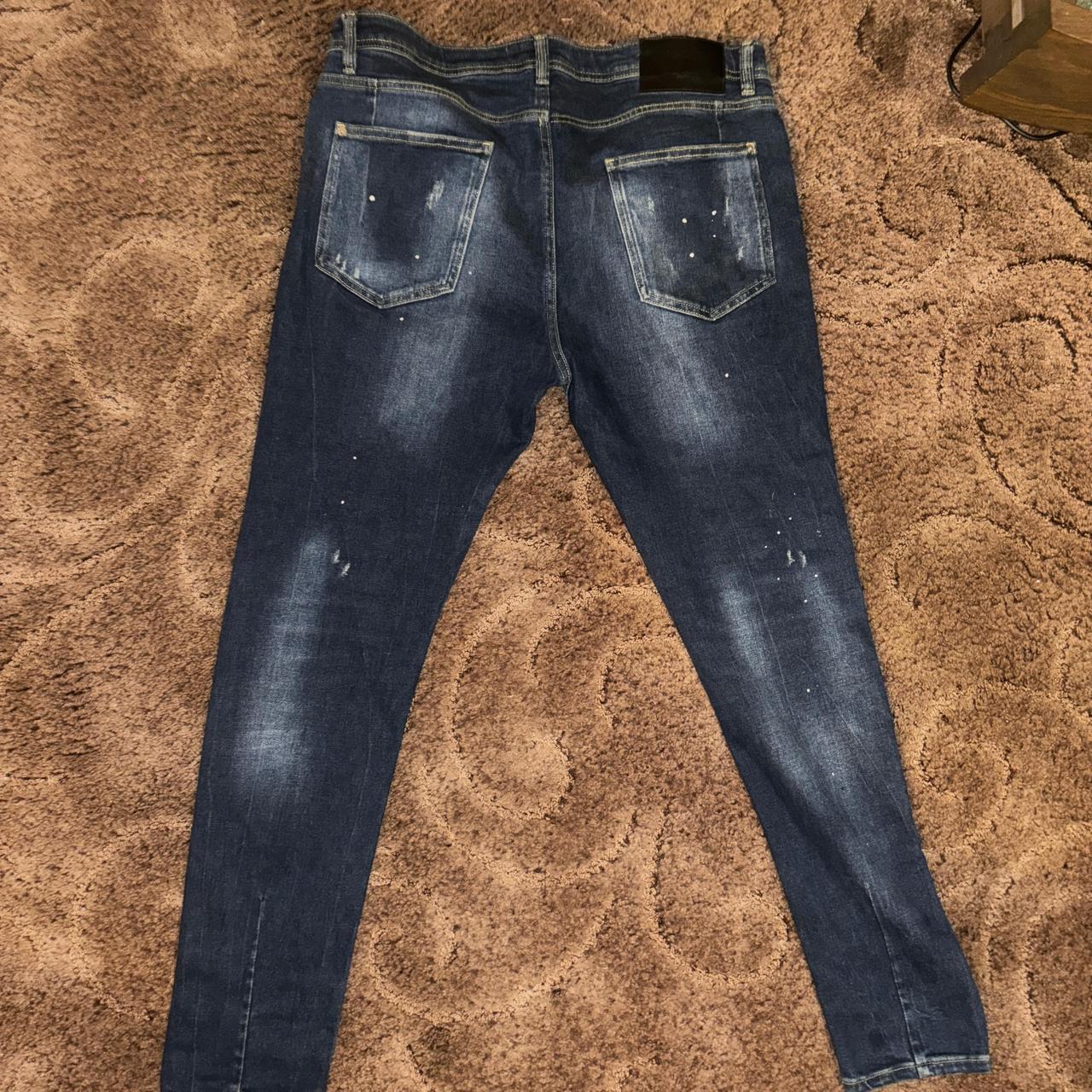 Zara Men’s denim ripped jeans with white paint design