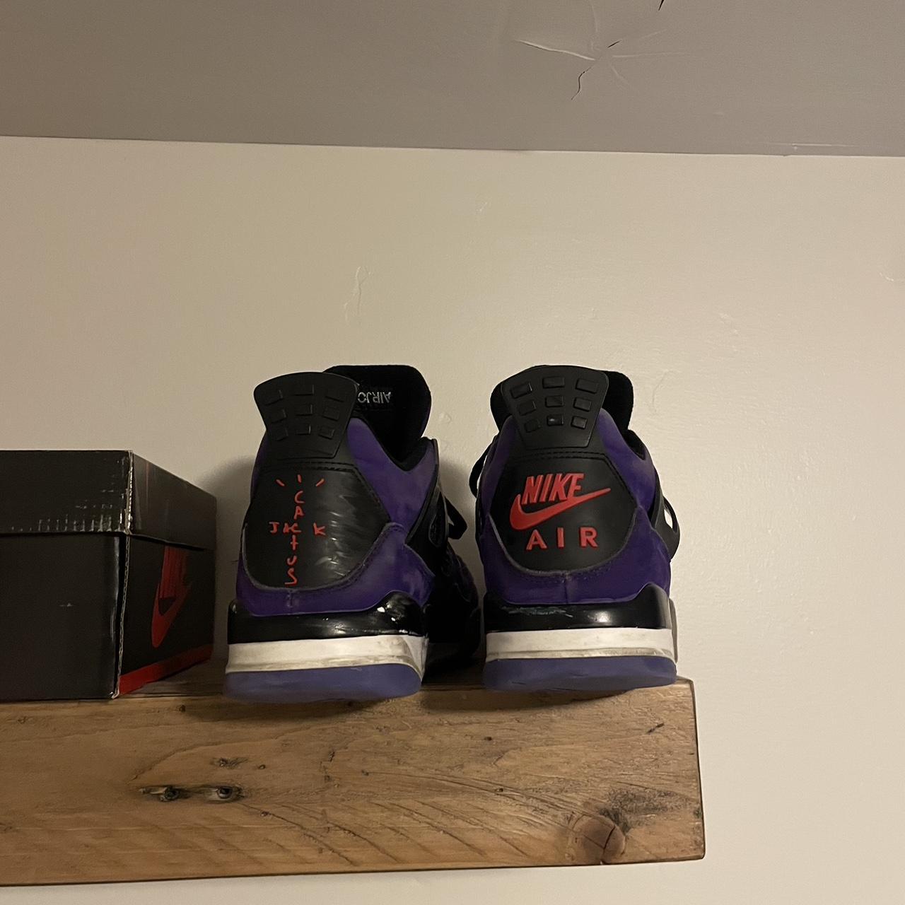 travis scott wearing jordan 4s