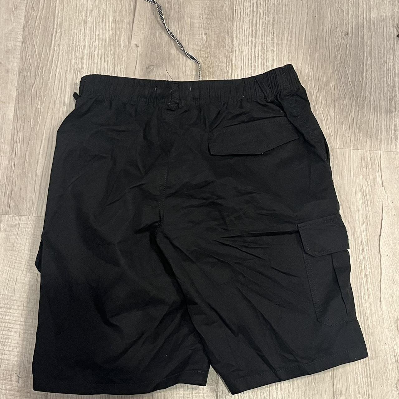 carhartt wip black cargo shorts size medium, never... - Depop