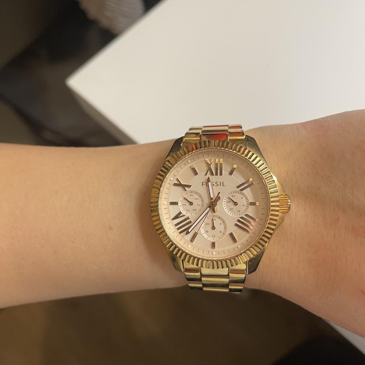 Gold fossil watch light discoloration on back depop