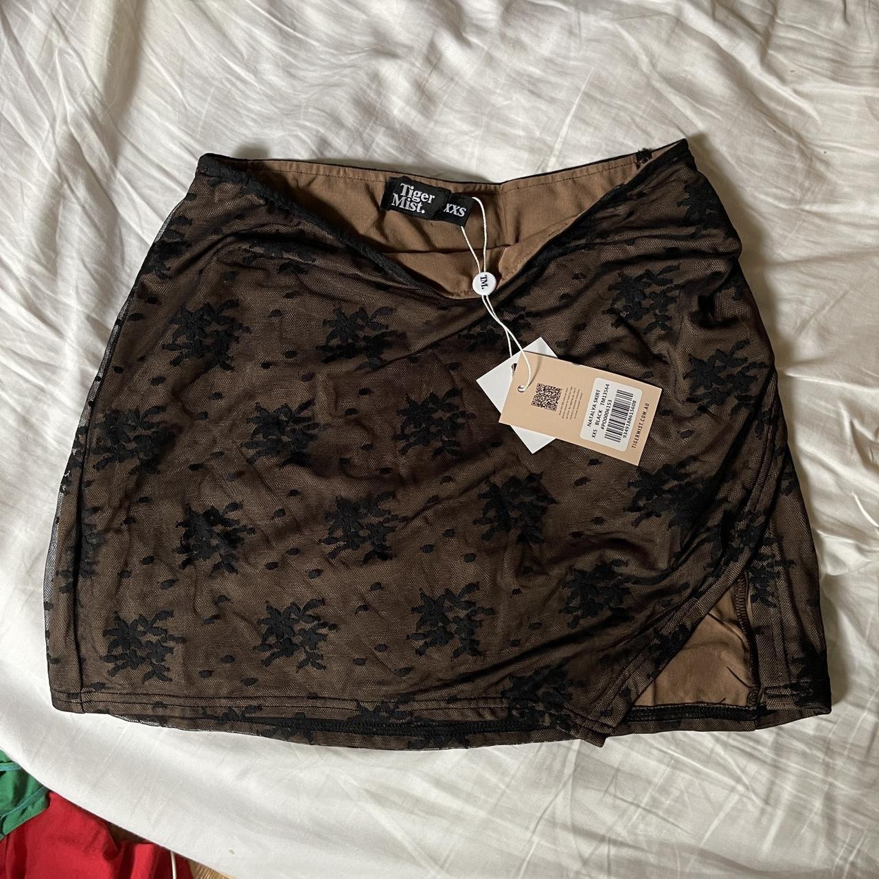 Tiger Mist Women's Black Skirt Depop