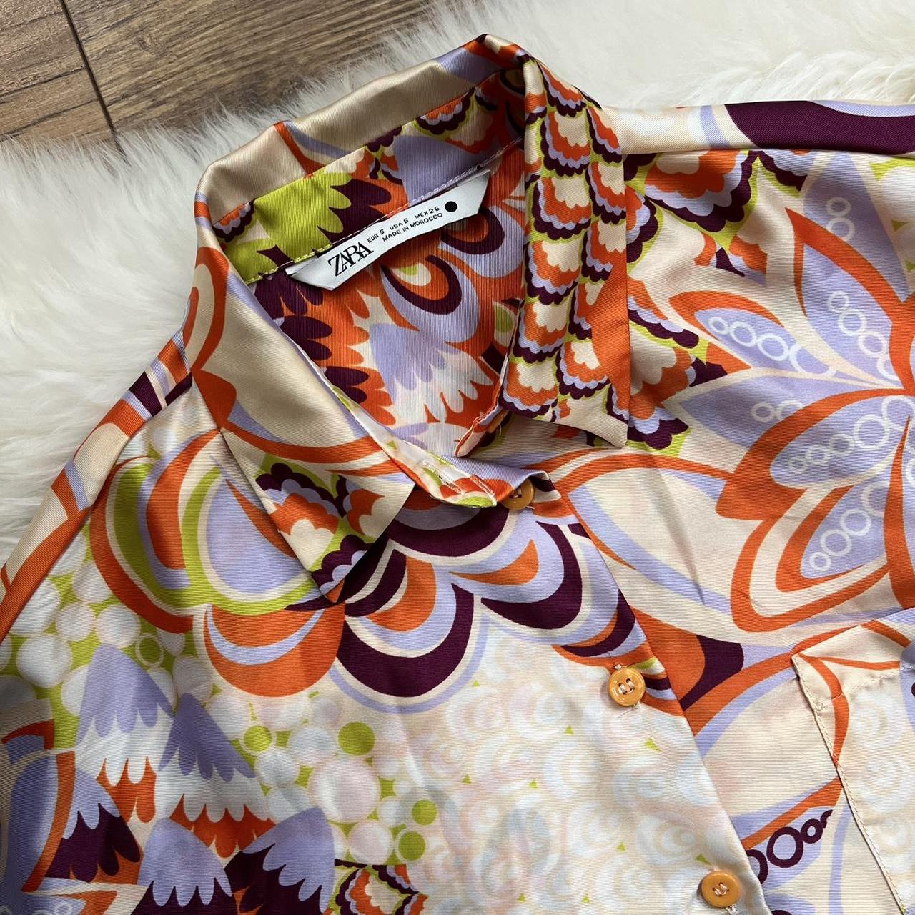 orange and purple blouse