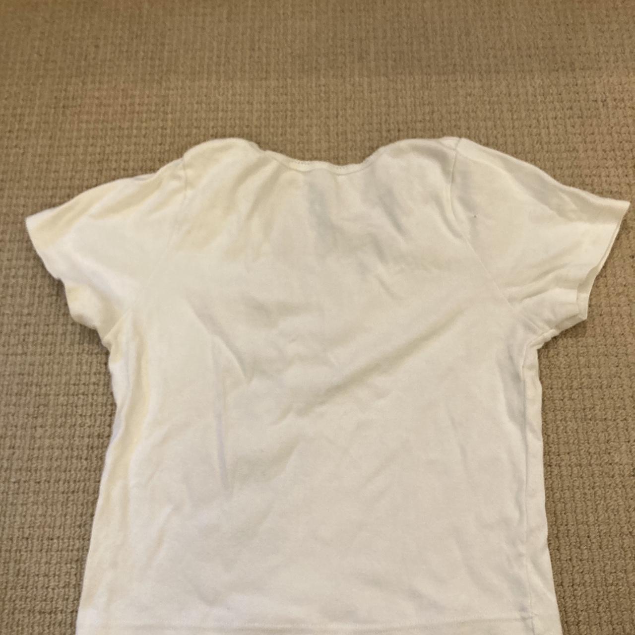 Brandy Melville top. tiny stain and basically blends... - Depop