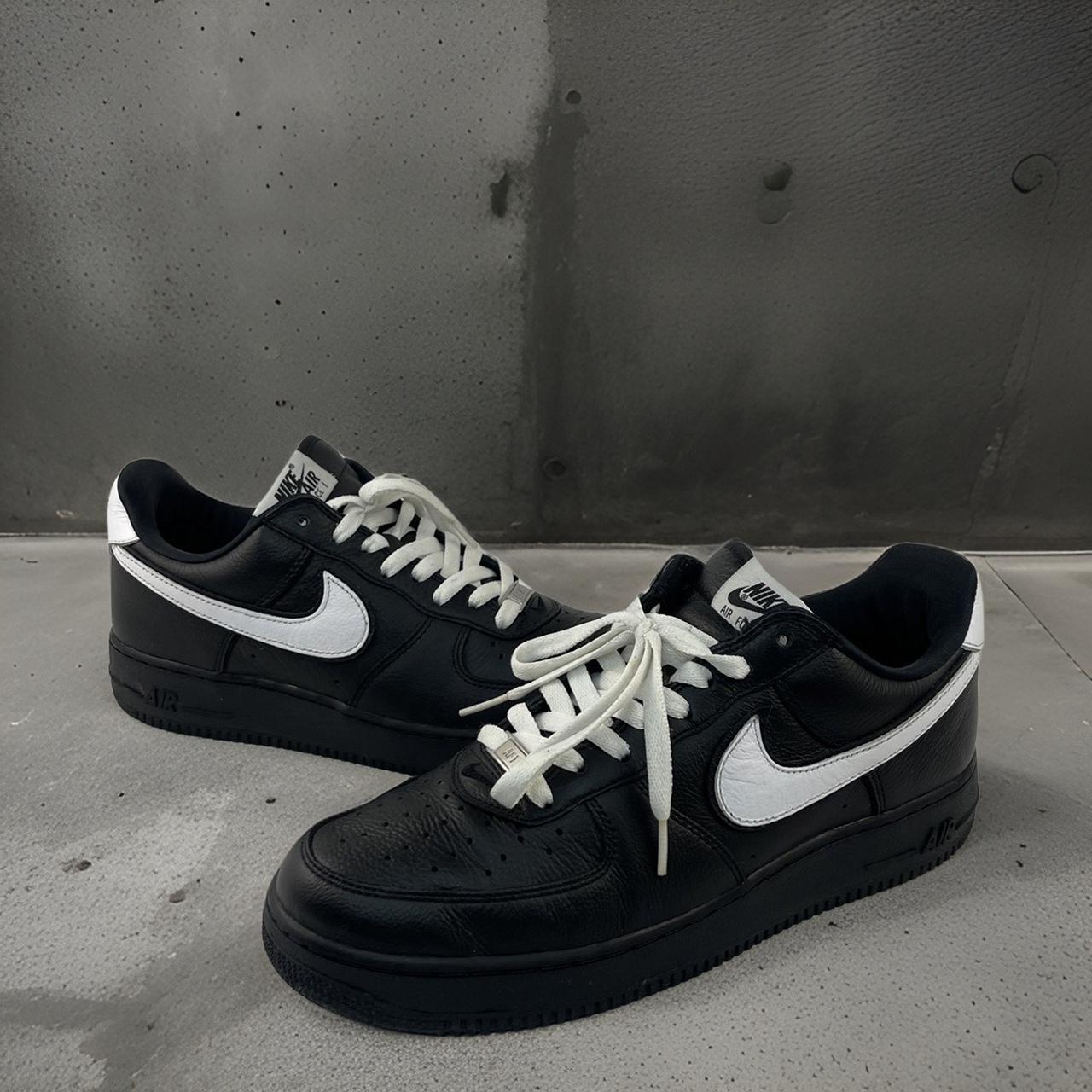 Nike trainers black with white tick hotsell