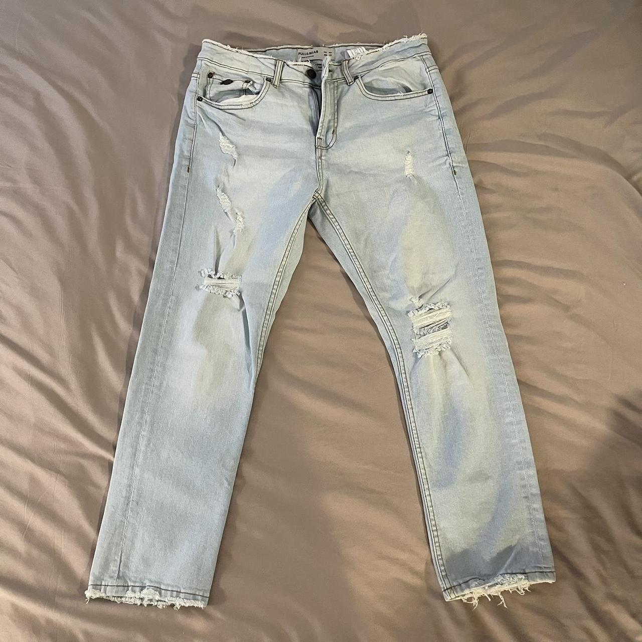 Distressed pull best sale on jeans