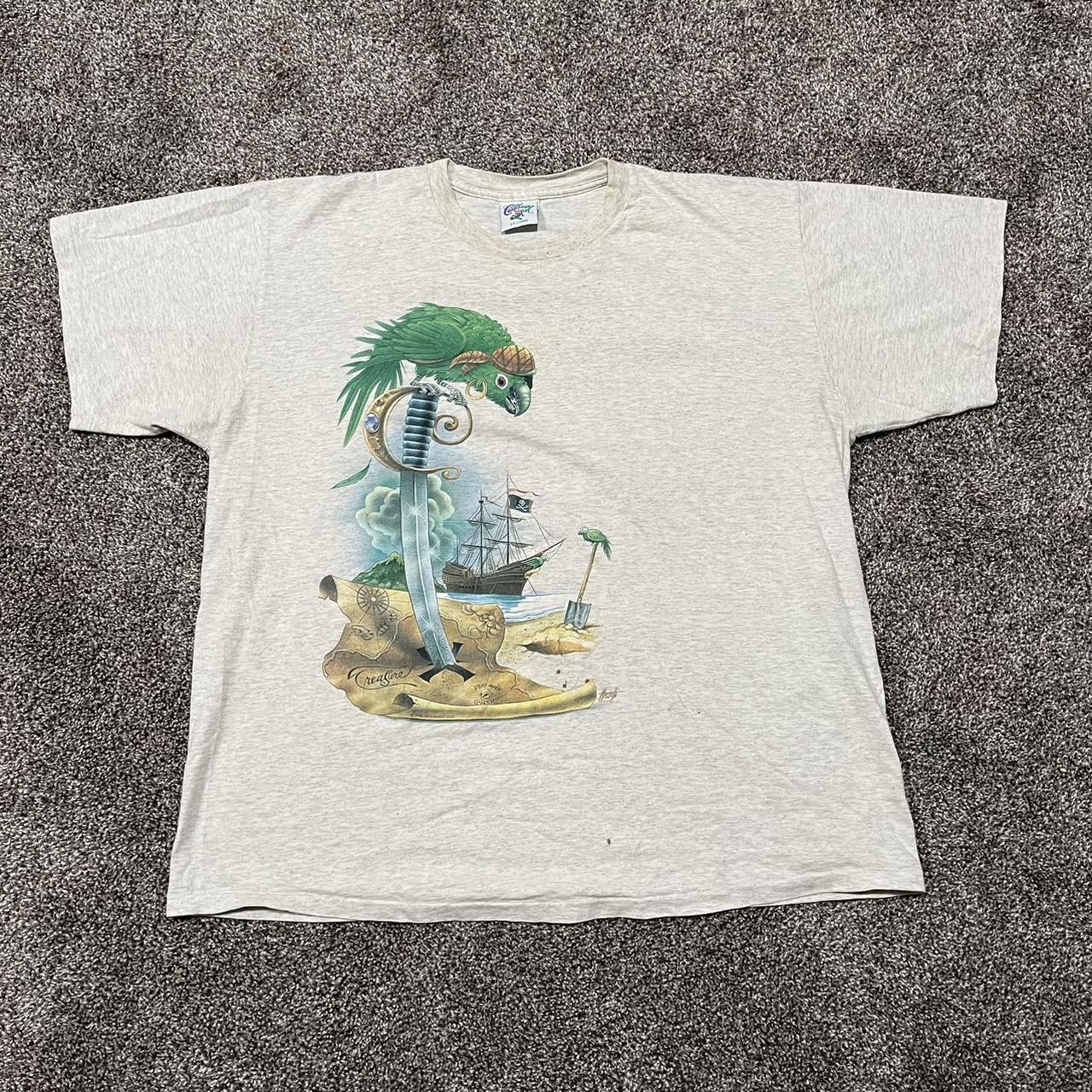 Vintage Parrots of the Caribbean graphic T-shirt... - Depop