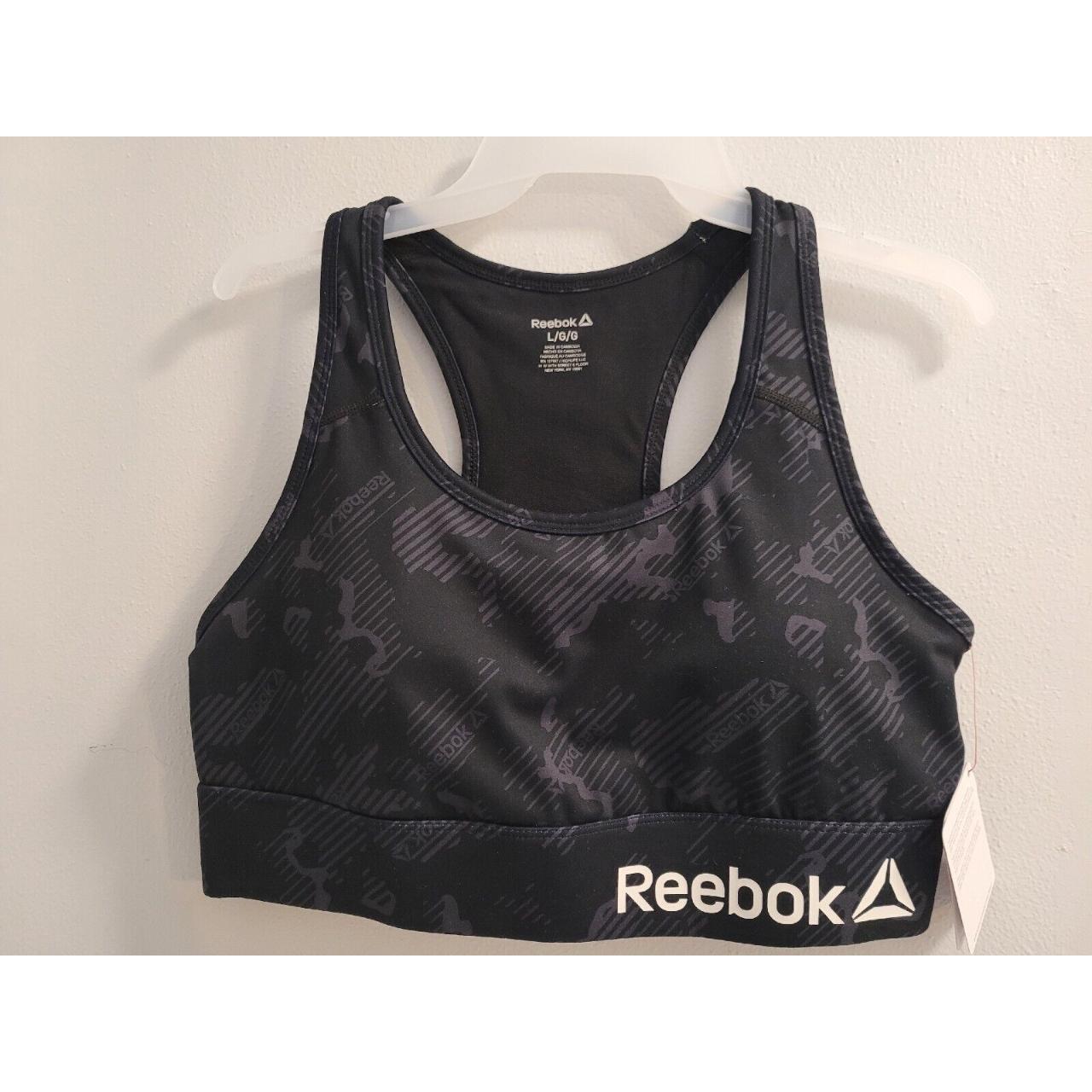 Reebok Women's Black Medium Impact Sports Bra Size - Depop