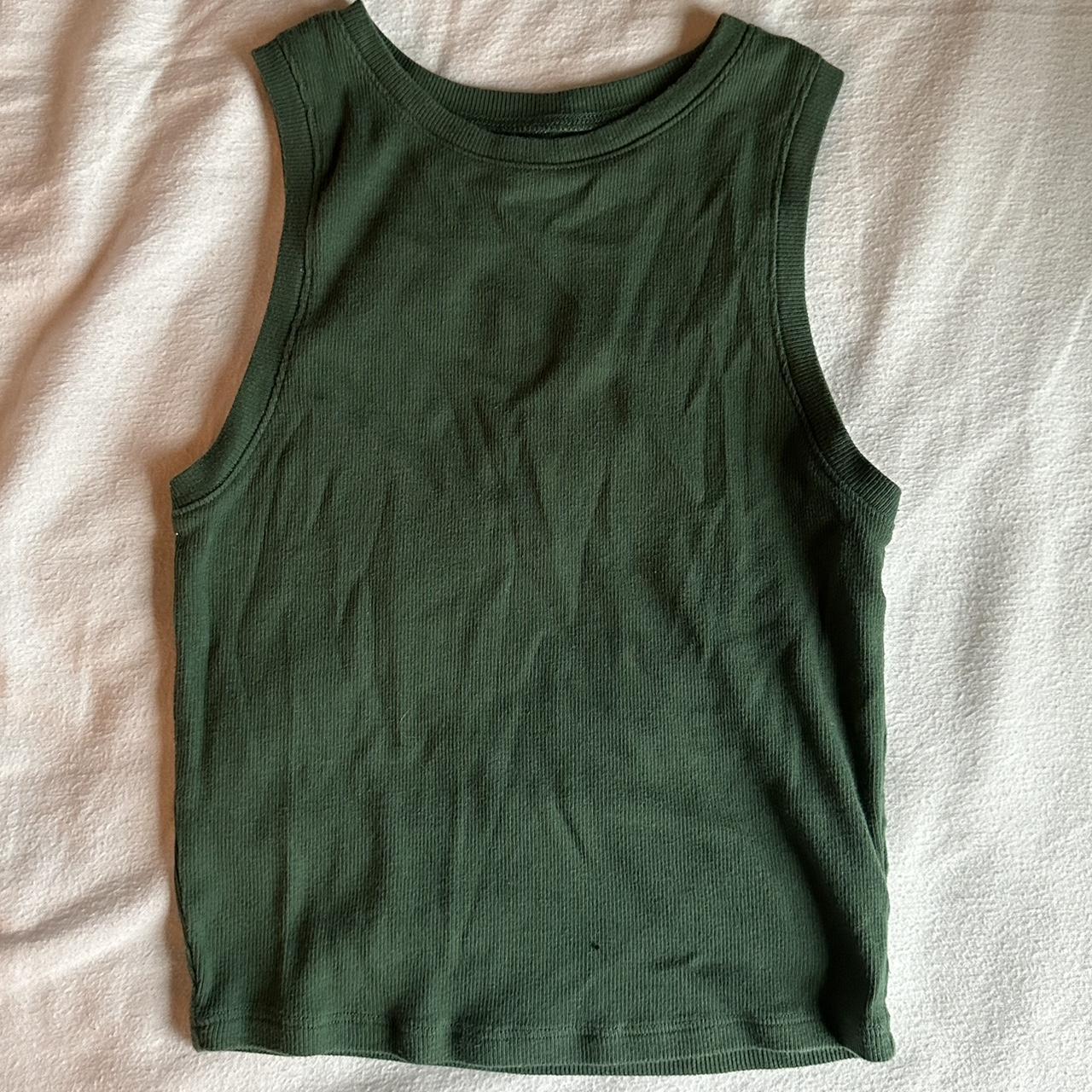 Wide neck tank -dark green -small stain on front... - Depop