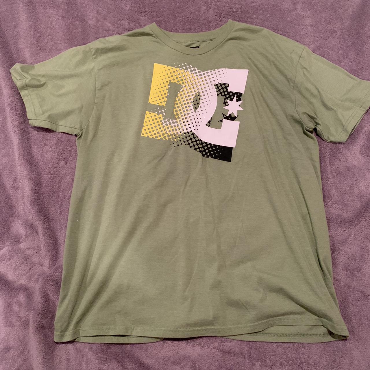 Dope green dc shirt that has yellow and white... - Depop