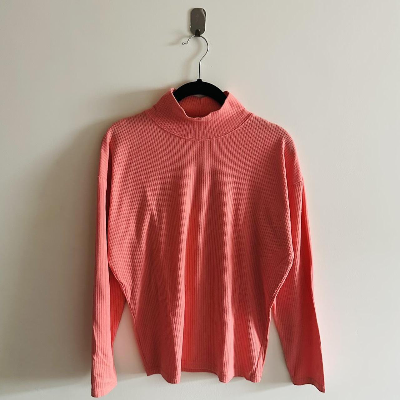 This peach colored turtleneck perfect for any