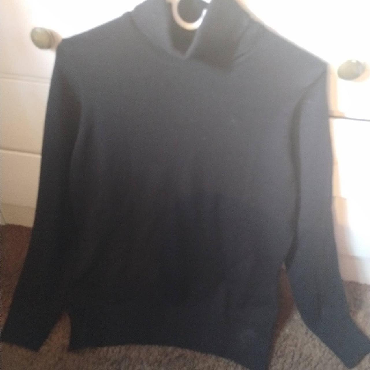 Soft black turtleneck on sale sweater