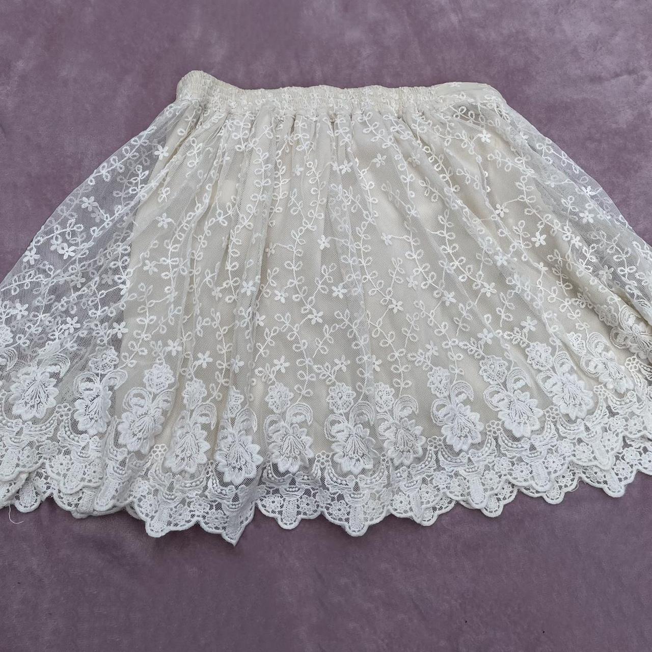 White/ cream embroidered lace skirt. Goes with so... Depop