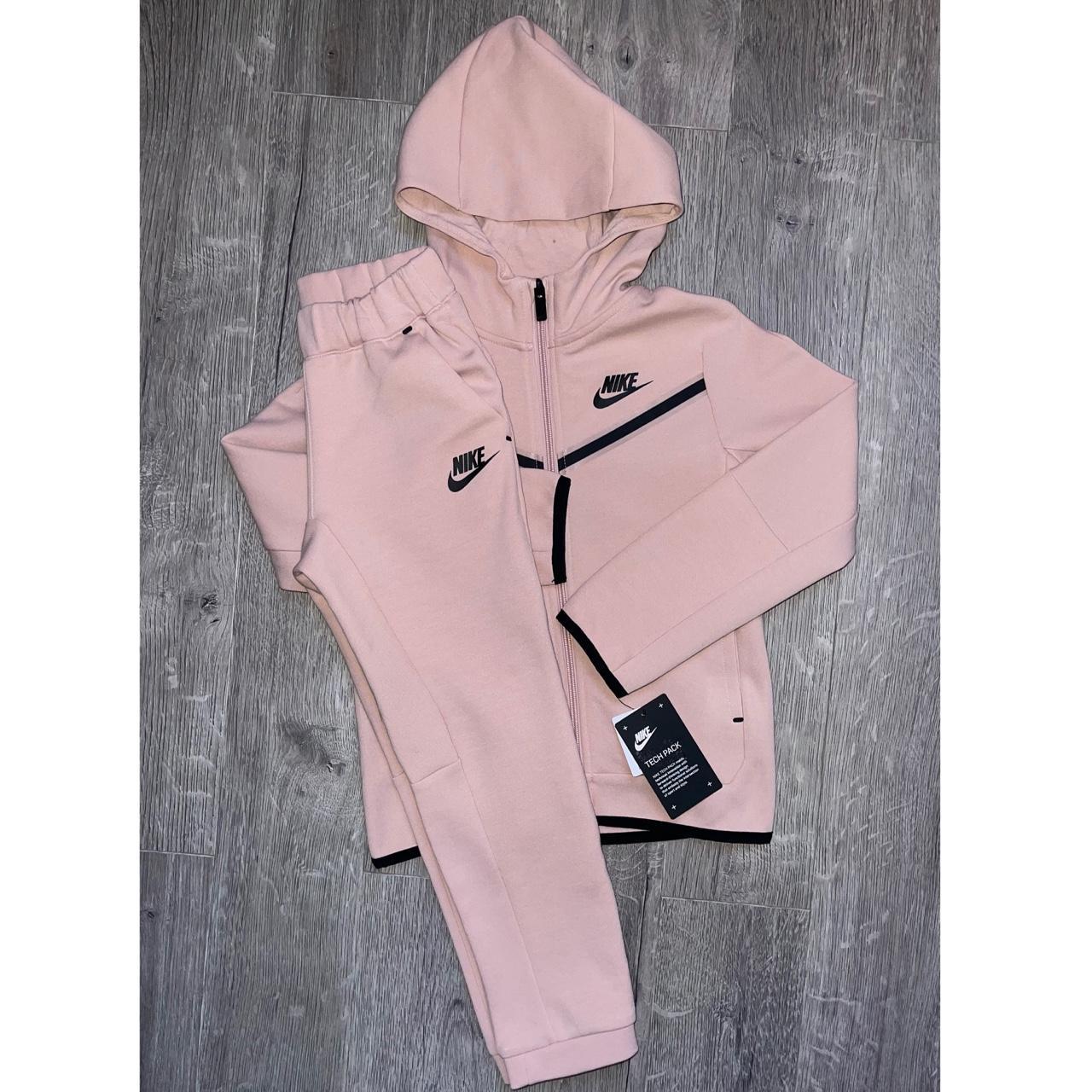 Light pink nike jogging suit best sale