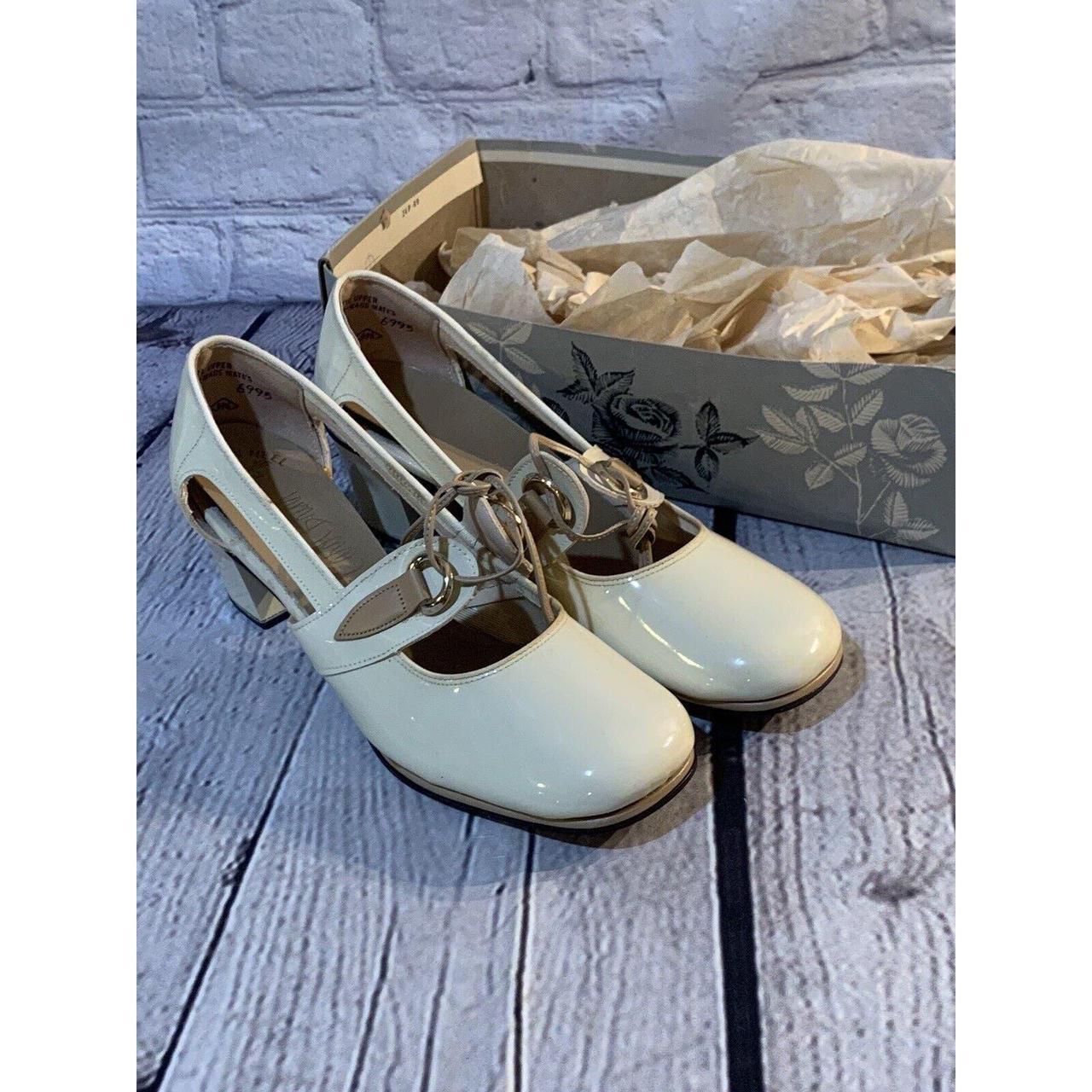 Step into a timeless piece of fashion with these... - Depop