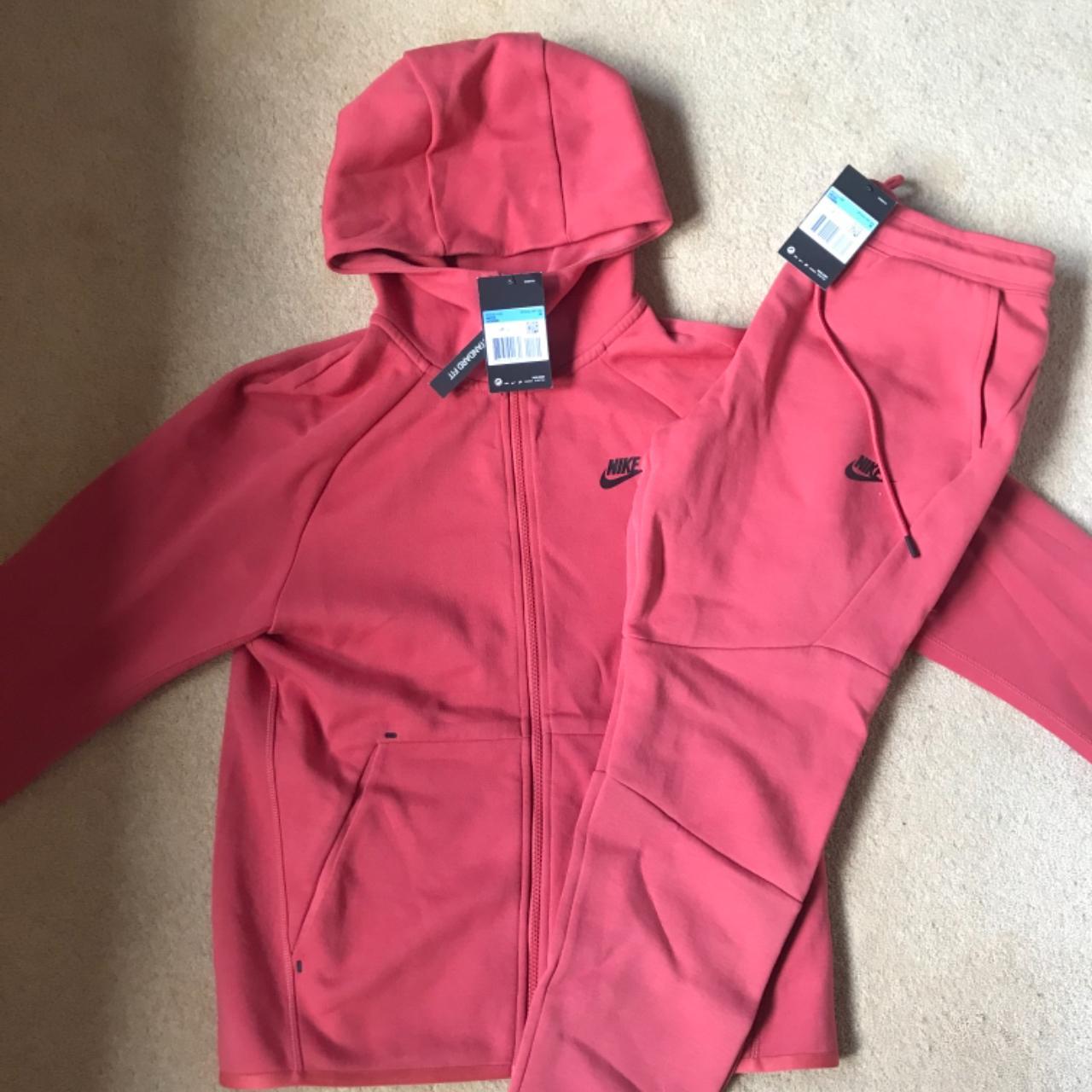 orange tech fleece tracksuit