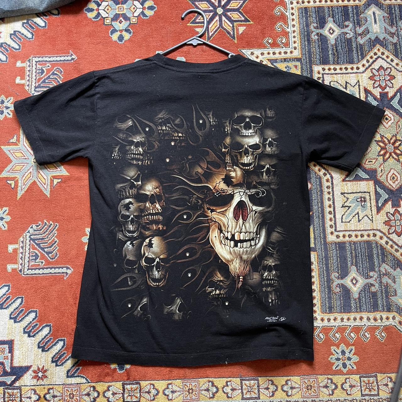 Cool black skull t shirt has the same print on the... - Depop