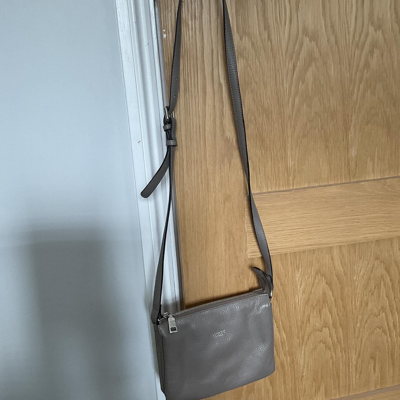 Taupe leather osprey crossbody bag with beautiful... Depop