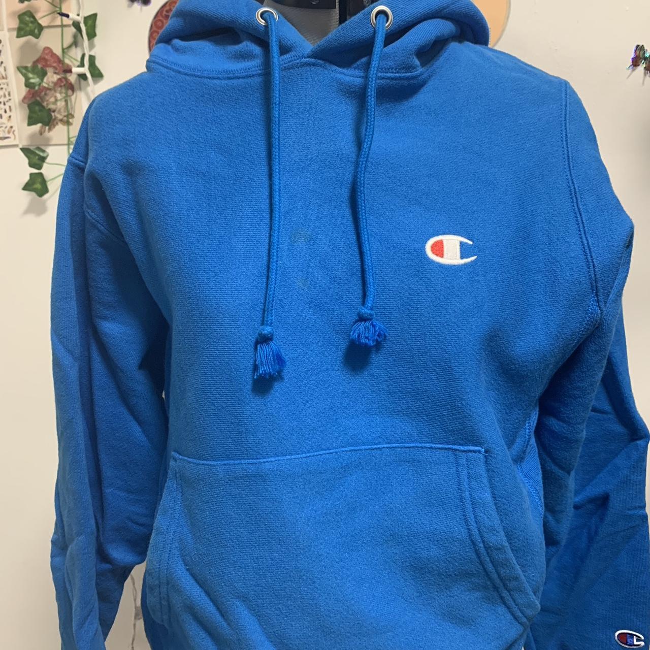 Blue champion hoodie - Depop