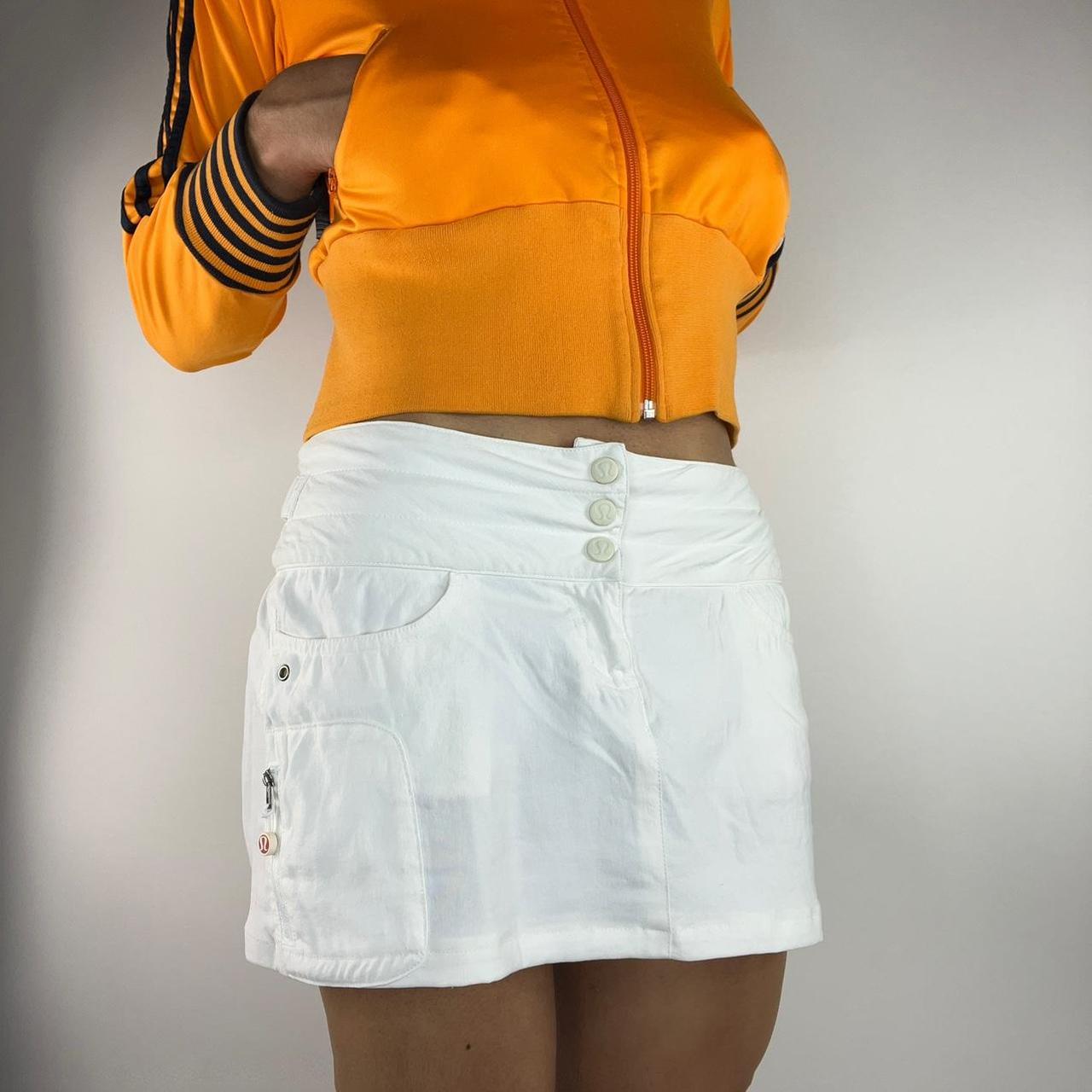 Early 2000s “Lululemon” nylon mini skirt with thick... - Depop