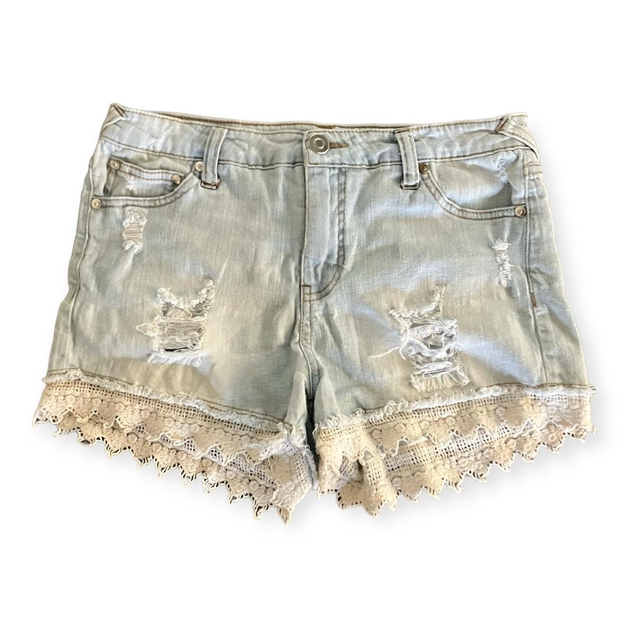 Elan Womens Light wash distressed denim shorts with. Depop