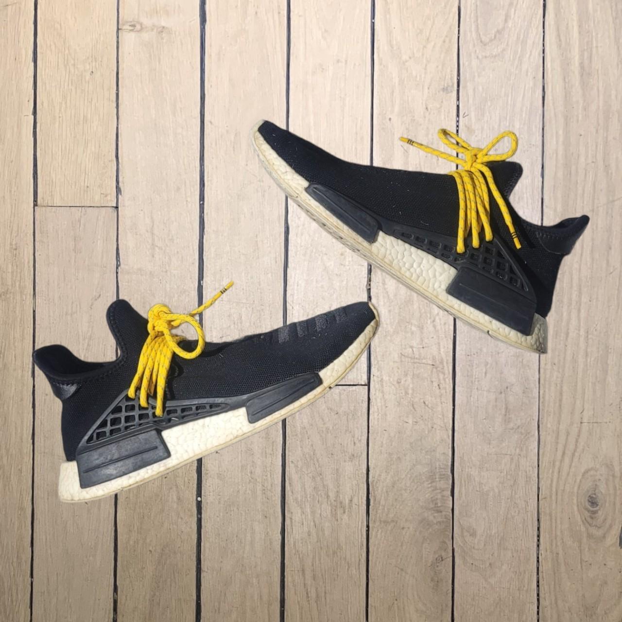 Adidas nmd human race black clearance yellow