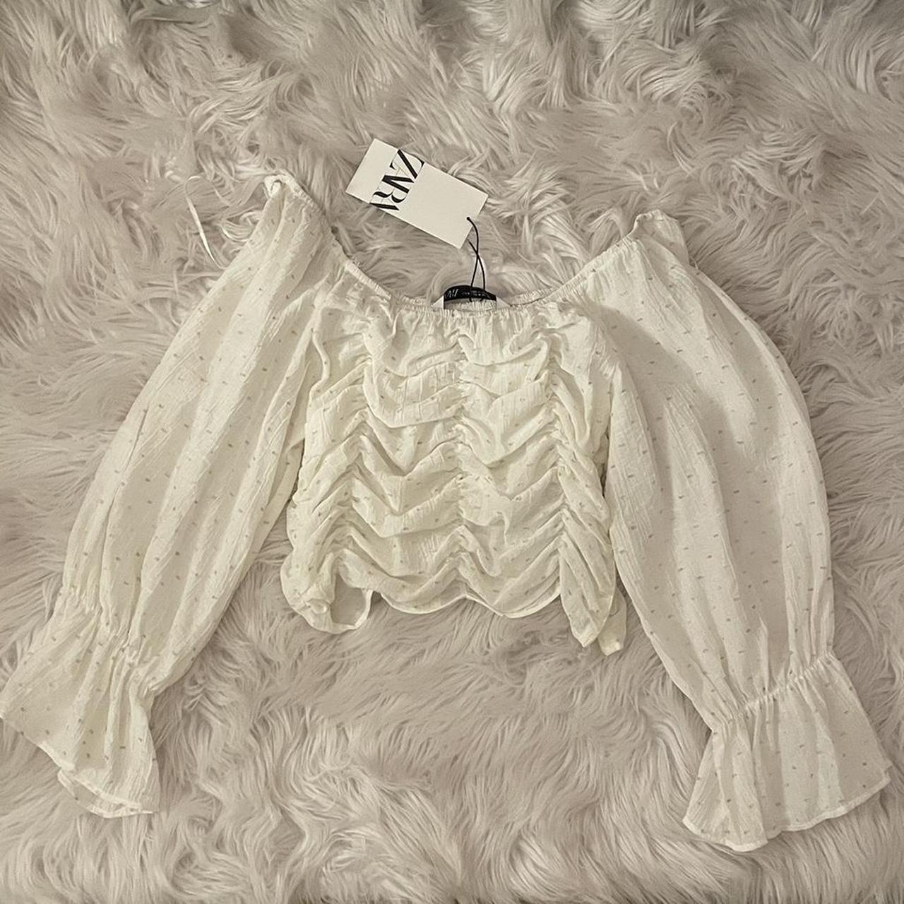 Zara white flowy sleeve top with gold/tan... - Depop