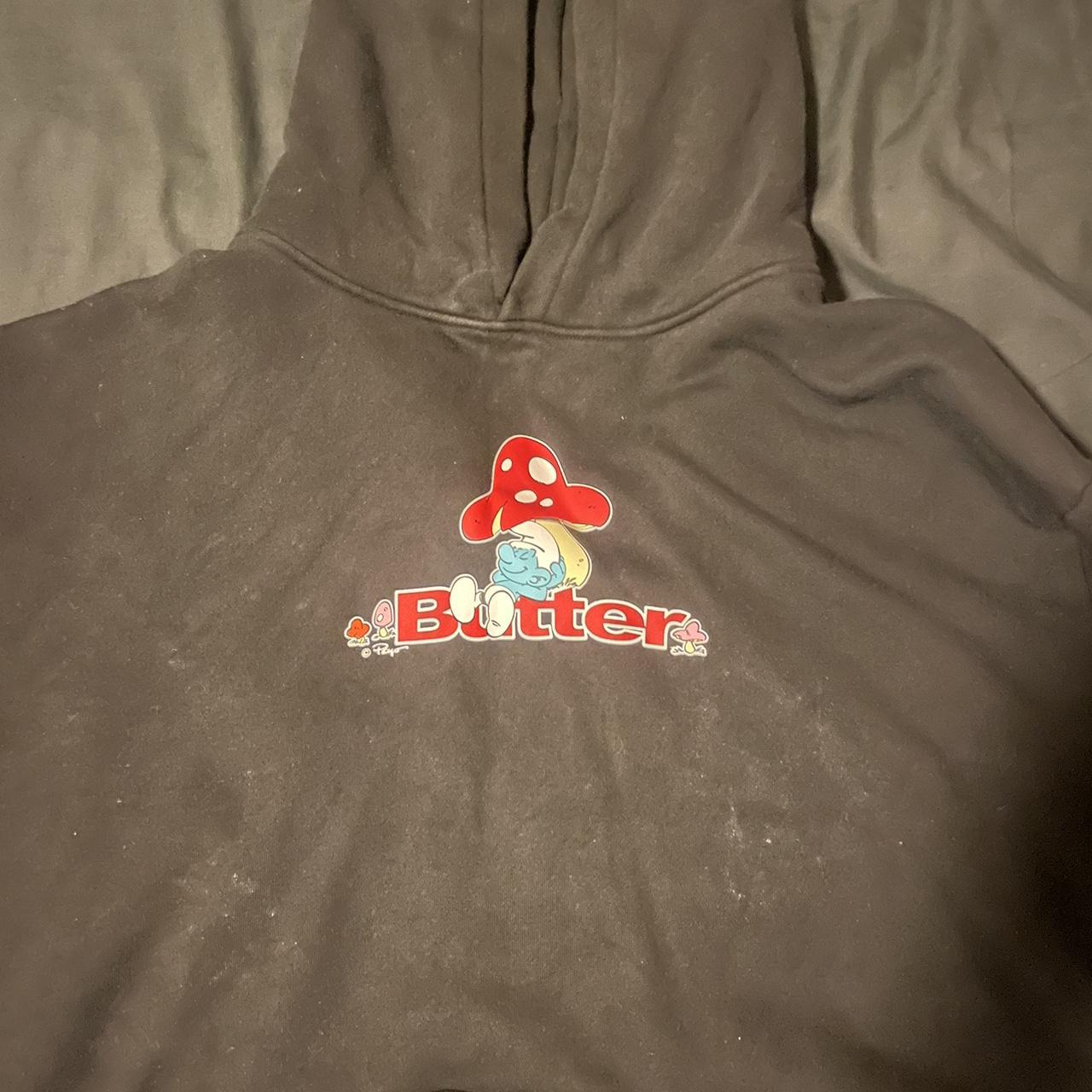 BUTTER X SMURFS HOODIE SIZE L small hole on side... Depop