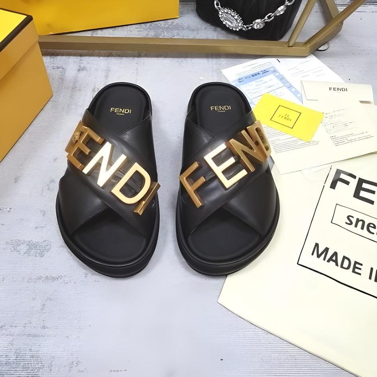 Fendi Women's Black and Gold Slides | Depop