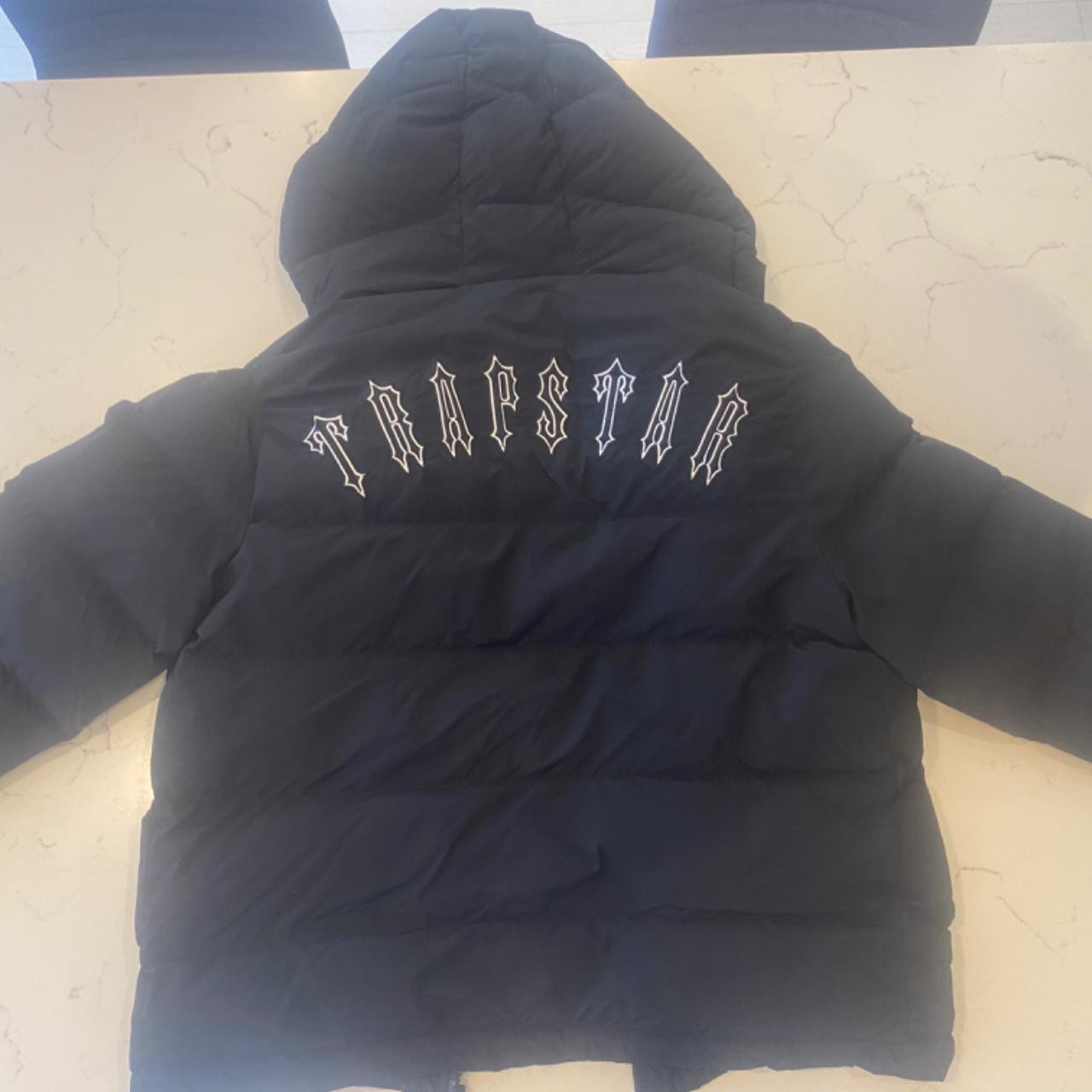 Black trapstar coat used but In good condition apart... Depop