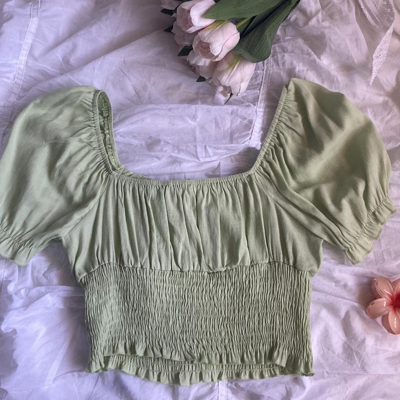 An adorable sage green Ally top in size 10, can be... - Depop