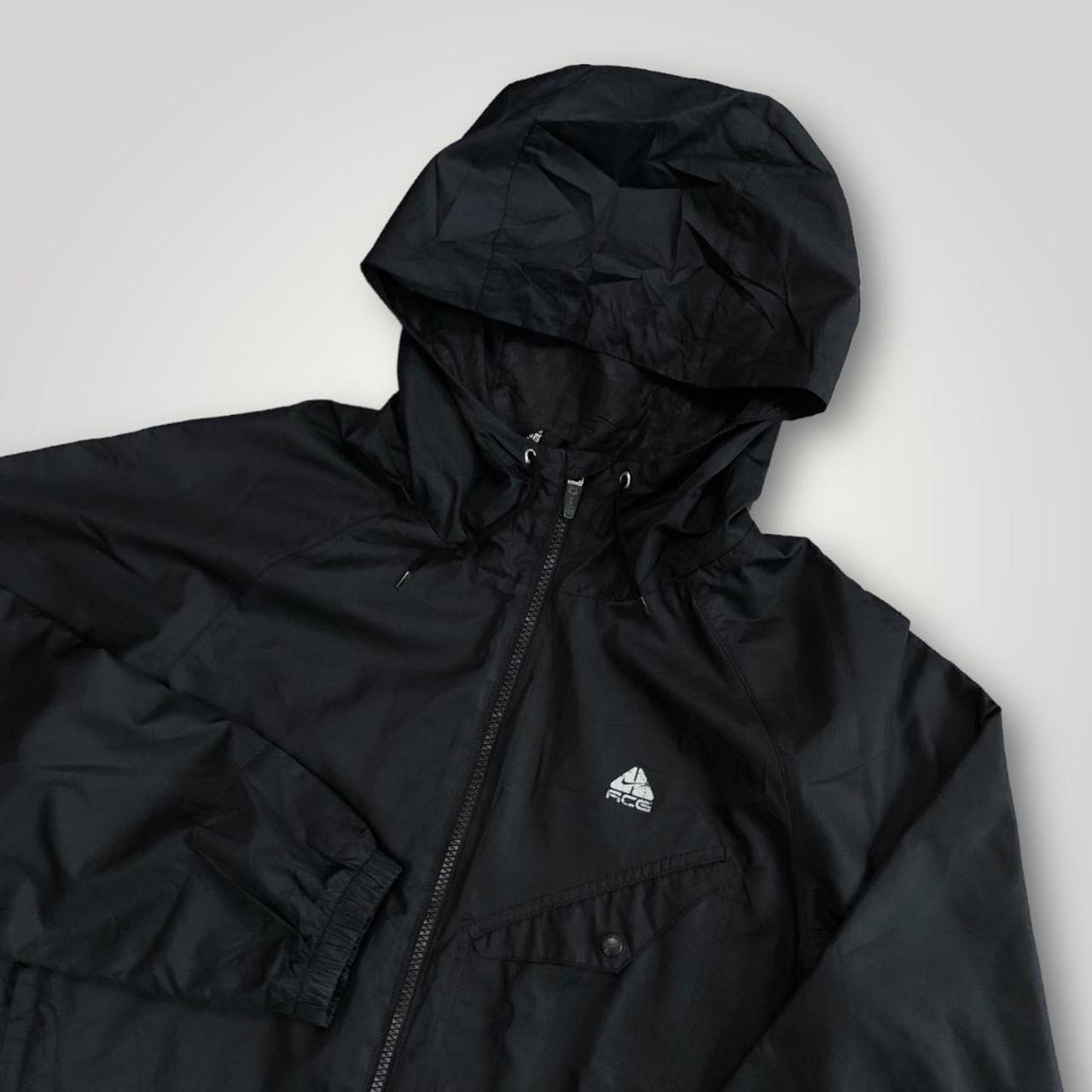 Nike ACG jacket in black with hood, print logo and... - Depop