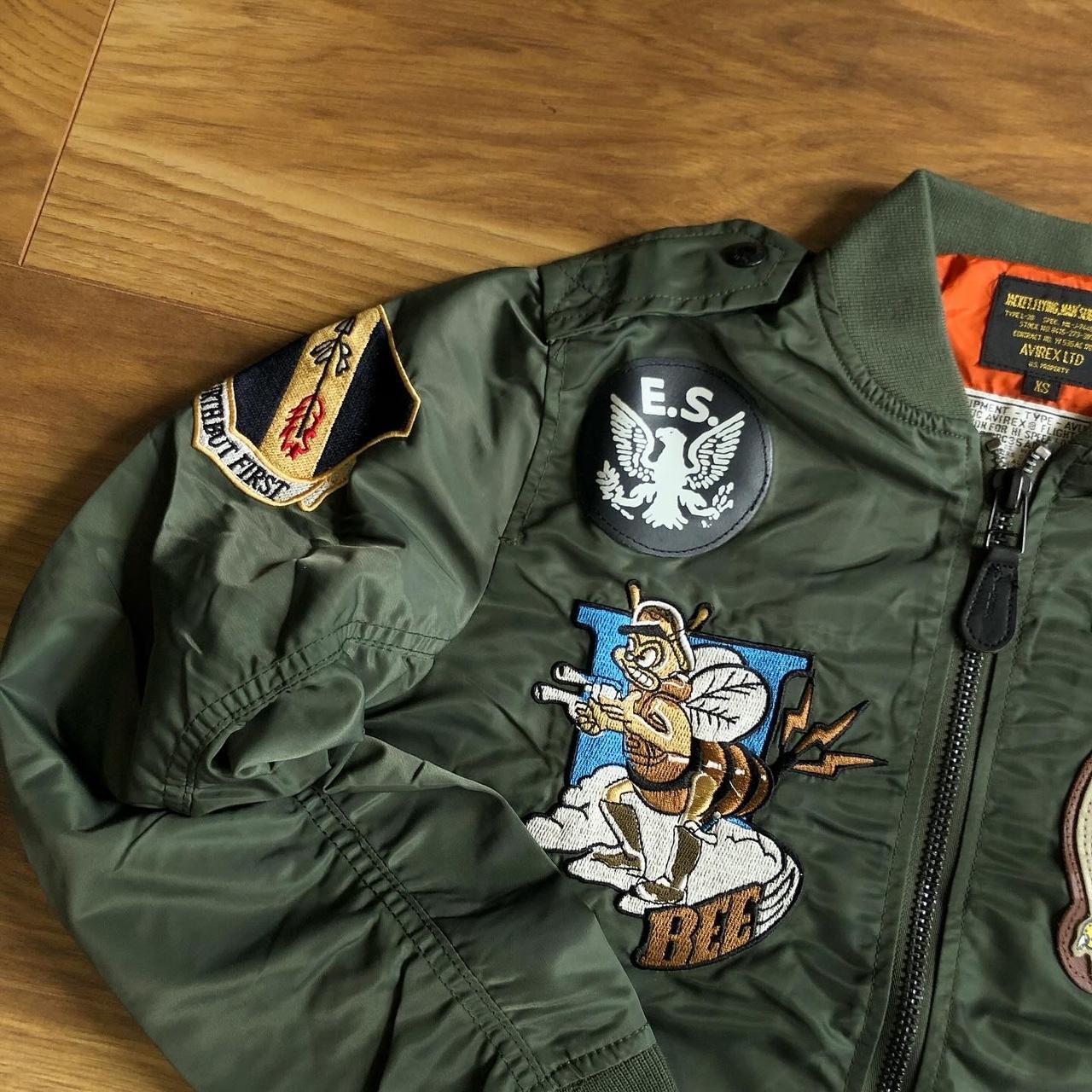Vintage Avirex women's bomber jacket in dark green. | Depop