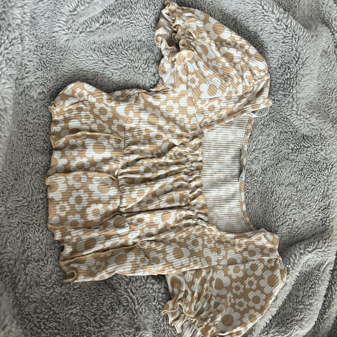 tan crop top with white flowers. fits Small, Medium.... - Depop