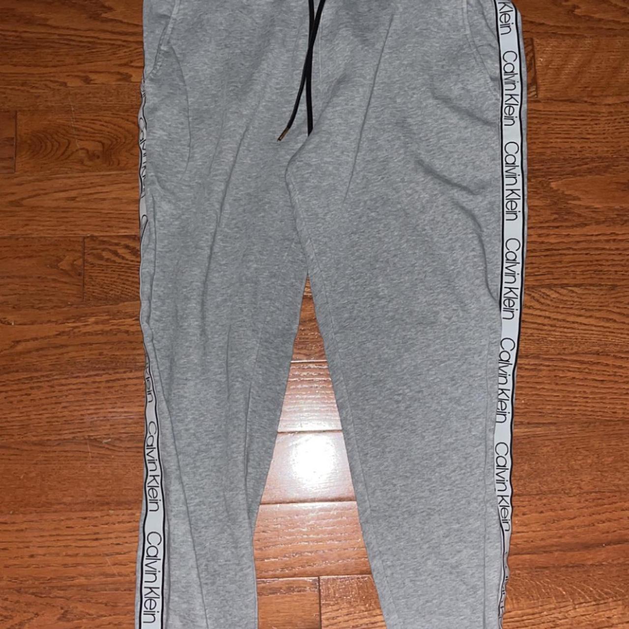 Calvin Klein grey sweatpants, lightly used - Depop