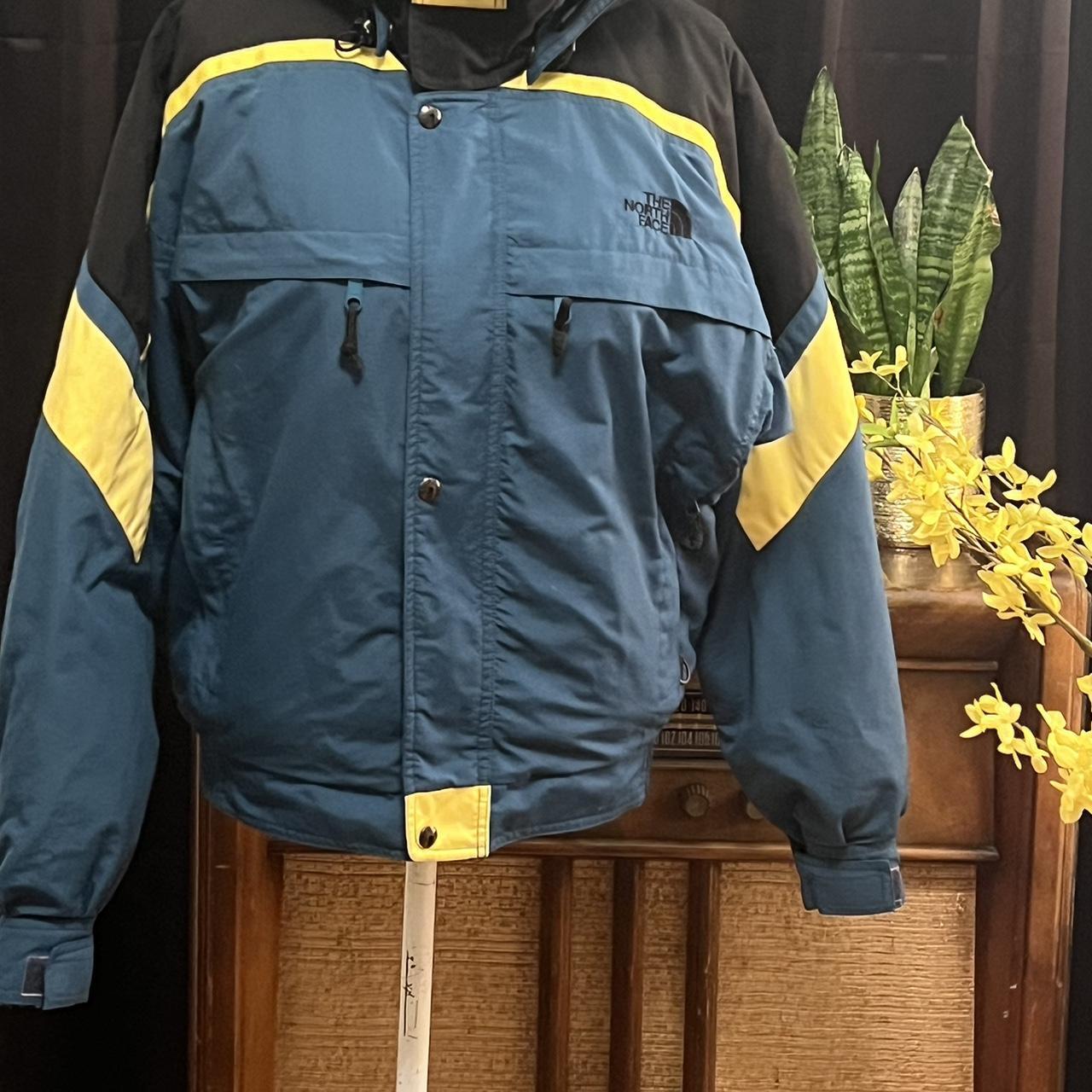 The north face blue and 2024 yellow jacket