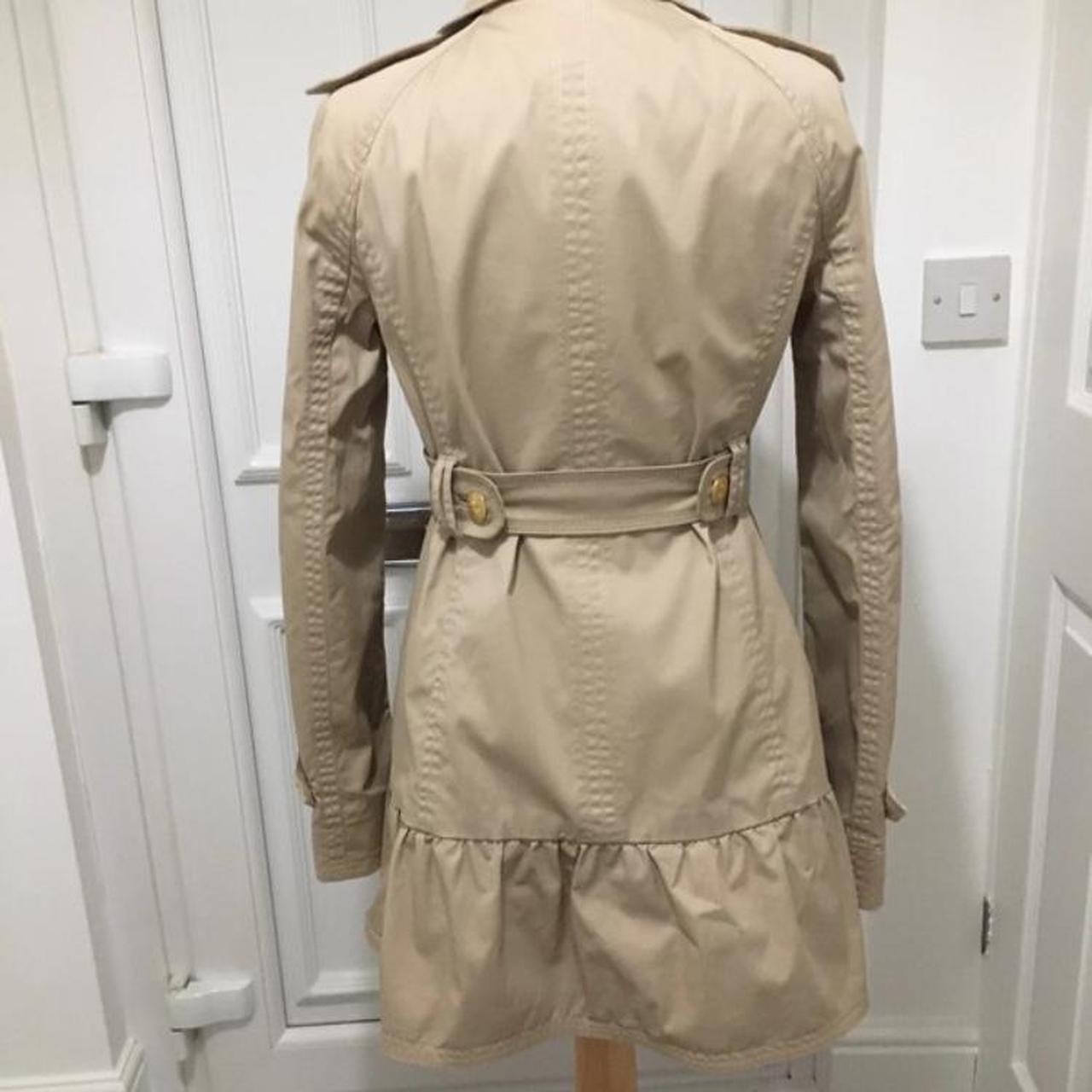 Juicy couture trench with separate belt. Fits upto a... Depop
