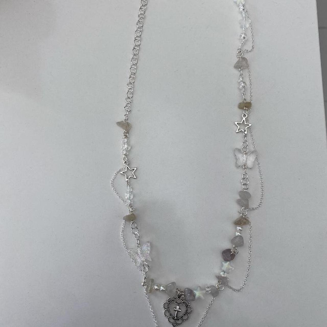 Cross/butterfly/crystal necklace. chain around... Depop