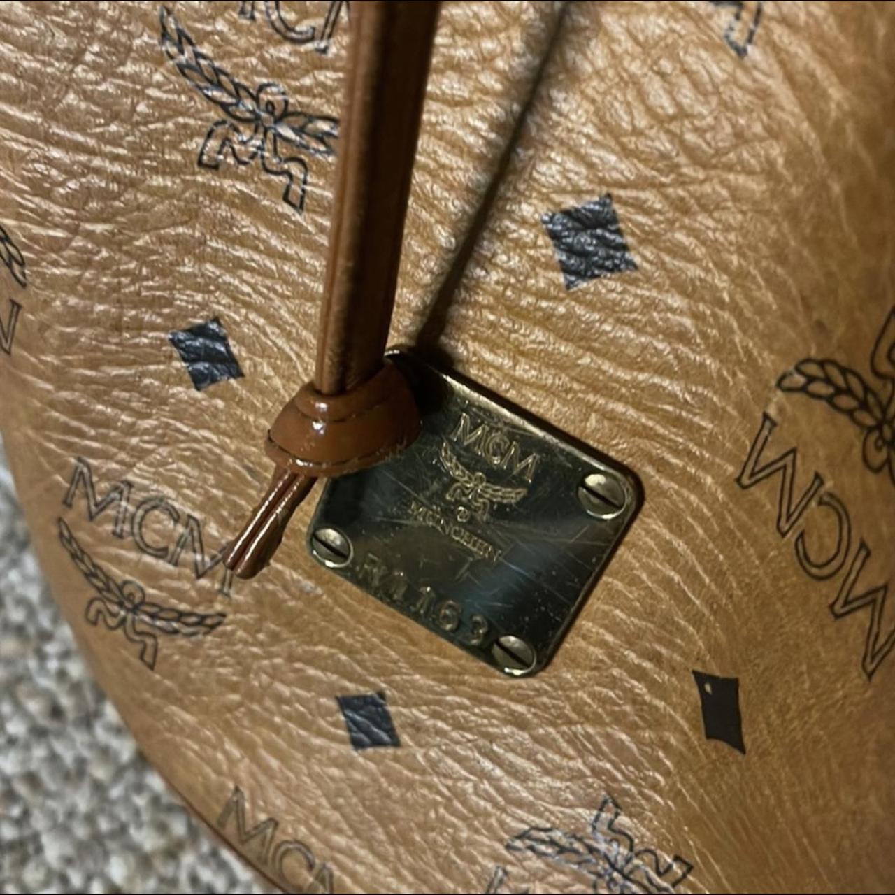 Authentic MCM cognac barrel bag. interior is in good - Depop